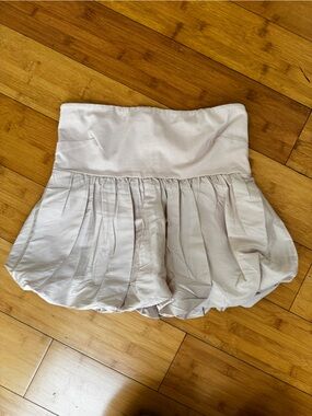 ANTHROPOLOGY drop waist bubble hem mini skirt in light tan